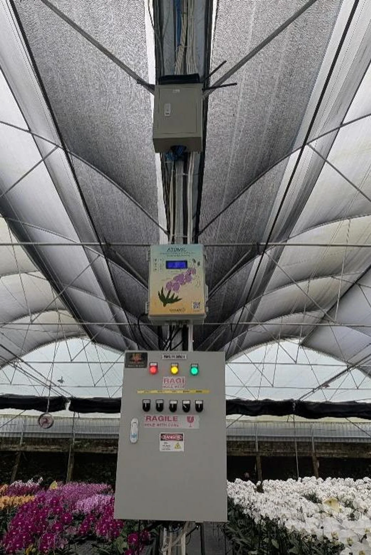 Orchid greenhouse at PT Von Florist with installed monitoring and control equipment